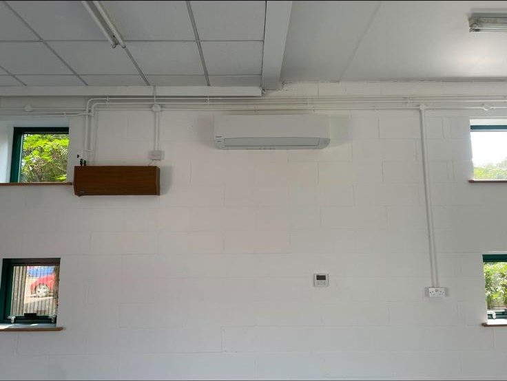 AC unit installed in a commercial warehouse