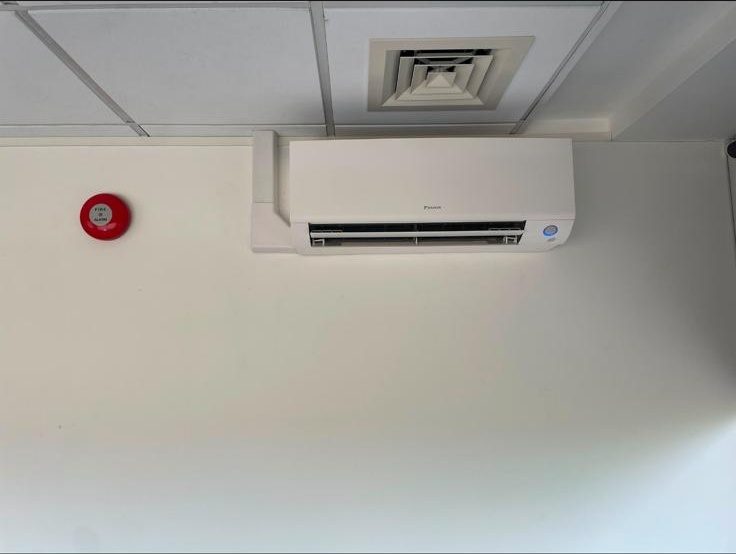 Ceiling-height AC unit installed in a commercial office
